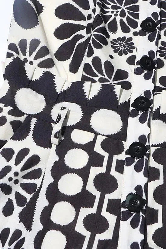 Vintage Floral Polka Dot Romper with Smocked Back, Square Neckline, and Slanted Pockets in Black and White-5